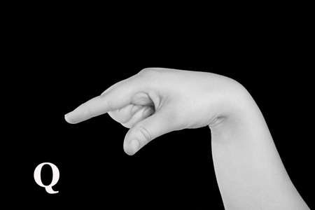 The Letter Q. Finger Spelling the Alphabet in American Sign Language (ASL).の写真素材