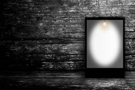 Blank billboard in empty dark room. 3D illustrationの写真素材