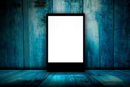 Blank billboard in empty dark room. 3D illustrationの写真素材