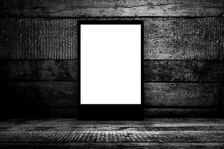Blank billboard in empty dark room. 3D illustrationの写真素材