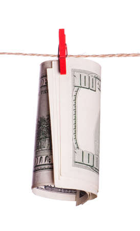 Dollar banknote with clothes pin on rope isolated on white background