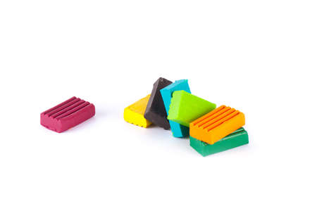 Photo children's colored plasticine isolated on white background. Materials for creativity