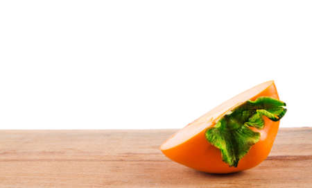 Ripe fresh persimmon isolated on white background. Food ingredient. Fruitsの写真素材