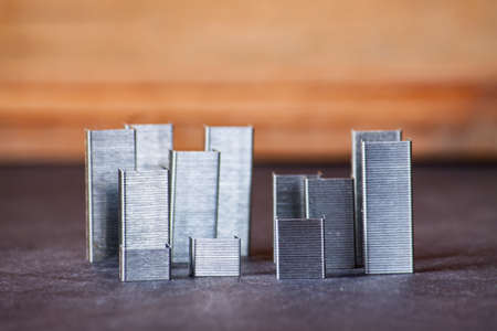 Concept new building. Staples from the Stapler on notebook