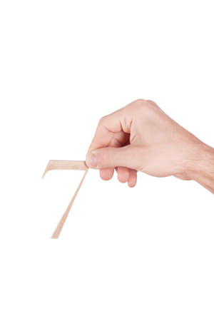 Hand holding wood sign on white backgroundの写真素材