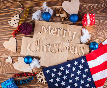 Wood inscription Merry Christmas on wood board. Greeting cardの写真素材