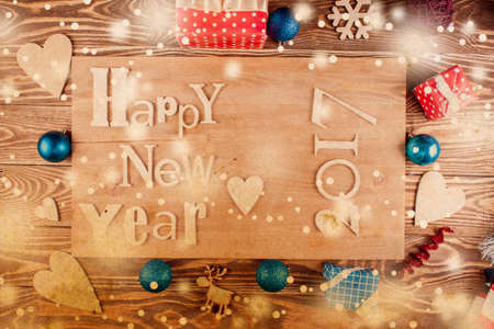 Wood inscription 2017 on wood board. Greeting card