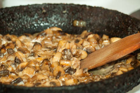 Fried mushrooms in a pan. Natural imageの写真素材