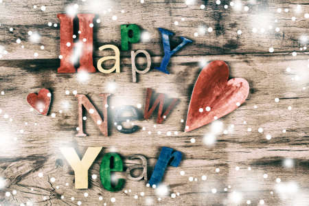 Multicolor wood inscription Happy New Year close up. Greeting cardの写真素材