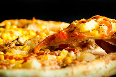 Fresh pizza with cheese on wood desk. Food background.の写真素材