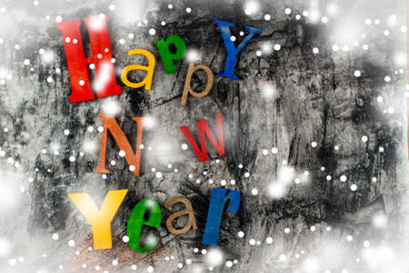 Multicolor wood inscription Happy New Year close up. Greeting cardの写真素材