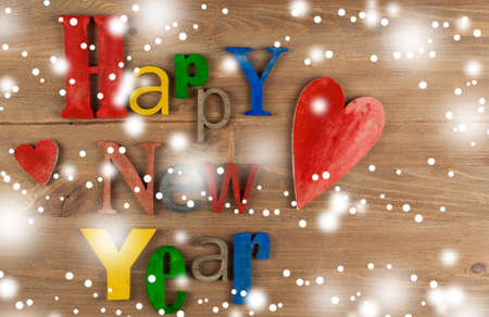 Multicolor wood inscription Happy New Year close up. Greeting cardの写真素材