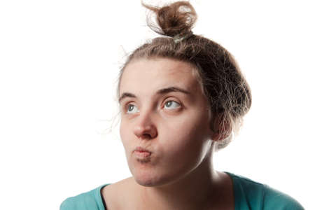 Lovely confused woman against isolated on white backgroundの写真素材