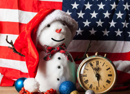 Snowman on wood desk. Greeting card. Christmas backgroundの写真素材