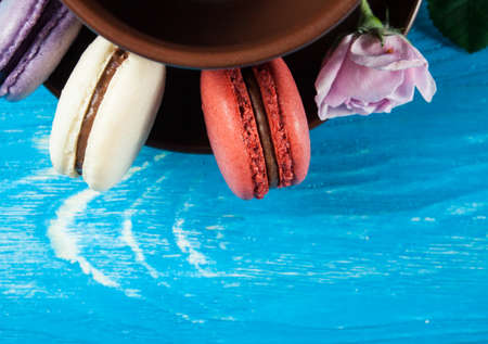 Multicolor macaroon on wood desk. Sweets. Food background.の写真素材
