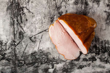 Smoked brisket close up on wood table. Meat productsの写真素材