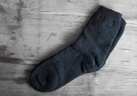 Pair of socks close up on wood deskの写真素材