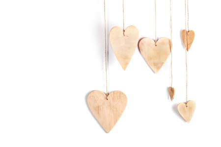Wood hearts on isolated on white background.  Valentine's day background.の写真素材