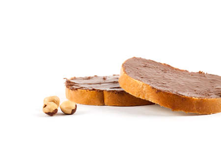 Chocolate nut butter and roasted hazelnuts. Foodの写真素材