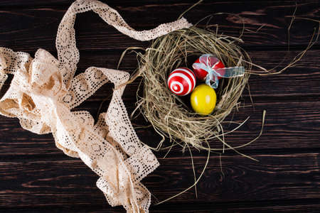 Easter eggs on wood desk. Nature backgroundの写真素材