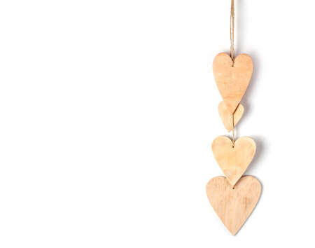 Wood hearts isolated on white. Valentine's day.の写真素材