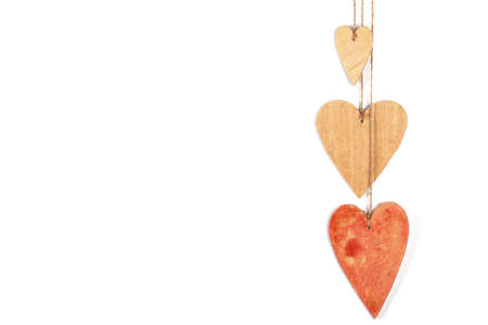 Wood hearts isolated on white. Valentine's day.の写真素材