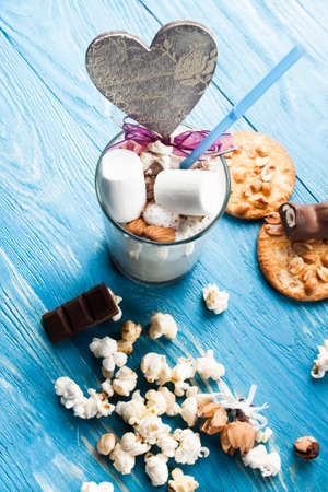 Fresh cappuccino with milk and sweets. Food backgroundの写真素材