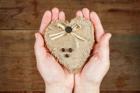 Heart from clothing in hand. Valentines day. International Women's Dayの写真素材