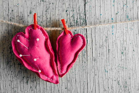 Heart from cloth on wood desk. Valentines day backgroundの写真素材