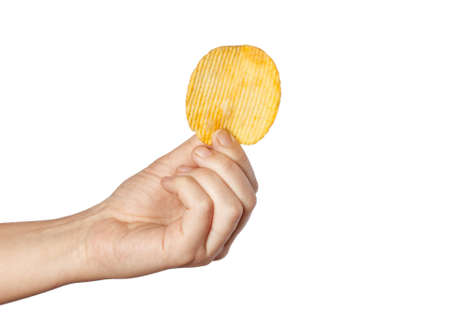 Fried potato chips corrugated isolated on white background. Food