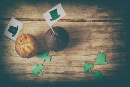 Happy St. Patrick's Day chocolate cake on wood desk. Baking.の写真素材