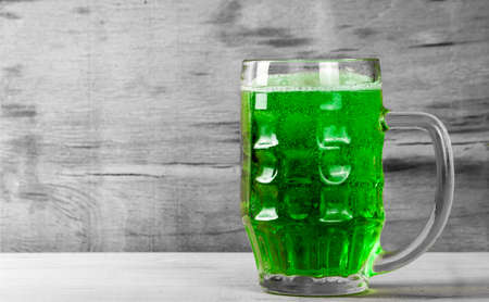 Happy St. Patrick's Day green drink on wood deskの写真素材