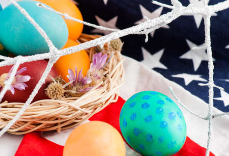 Colorful easter eggs close up with american flagの写真素材