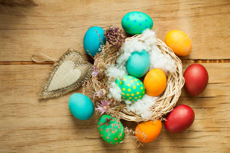 Colorful easter eggs close up on wood desk