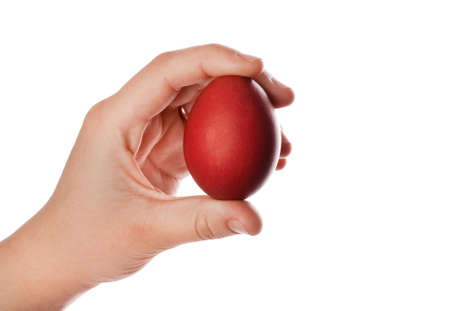 Colorful easter eggs in hand isolated on white background