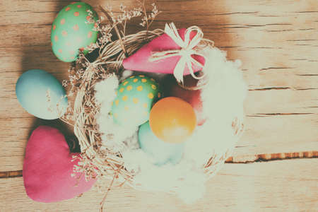 Colorful easter eggs close up on wood desk