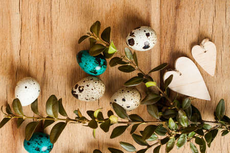 Colorful easter eggs close up on wood deskの写真素材