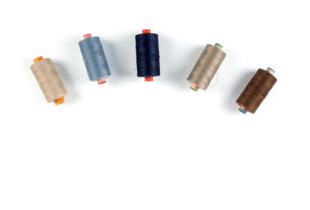 Spools with color threads isolated on white backgroundの写真素材