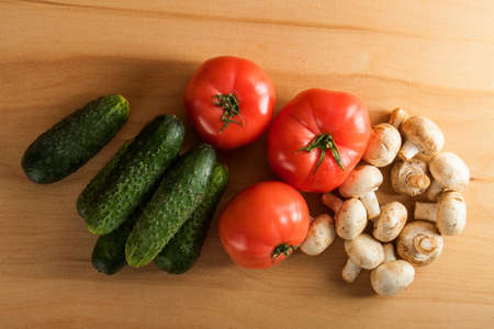 Ripe fresh vegetables on wood table. Food backgroundの写真素材