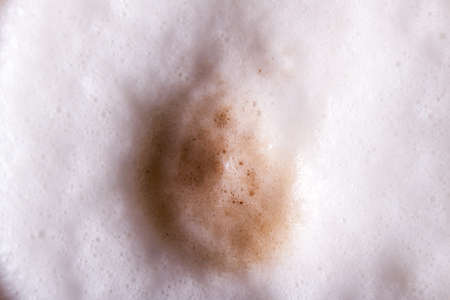 Coffee foam close up. Food background. Nature