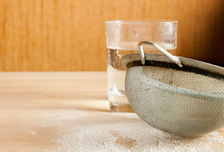 Kitchen table with ingredients for preparing dough. Cookingの写真素材