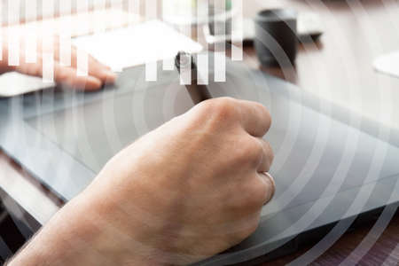 The designer behind the workplace. Development of graphic projectsの写真素材