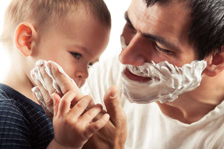 Father and son shaves.  Family concept. Paternal careの写真素材