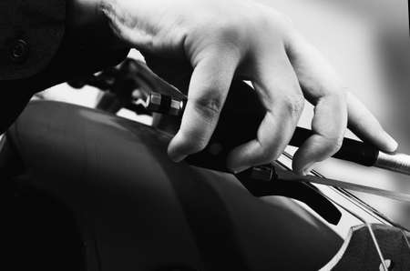 Man playing on cello close up. Music background. Education conceptの写真素材