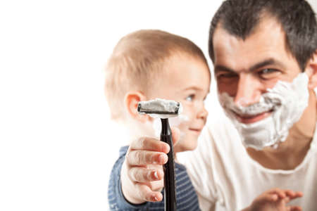 Father and son shaves.  Family concept. Paternal careの写真素材