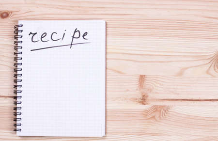 Notebook for recipe on sackcloth. Food backgroundの写真素材