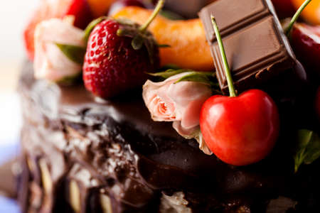 Fruit chocolate cake close up. Food ingredients. Dessertsの写真素材