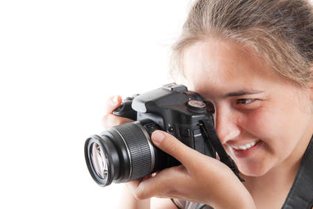 Woman photograph with camera in hand on white background