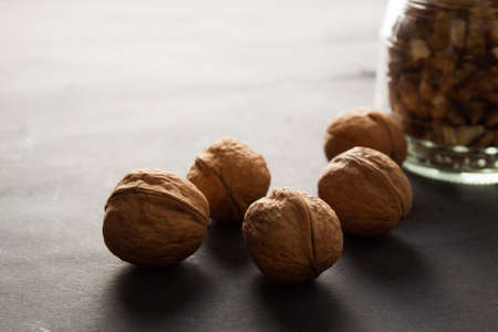 Nuts of walnut on the boards. Food ingredientsの写真素材