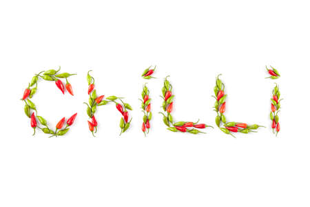 Small chilli pepper close up isolated on white. Food ingredients.の写真素材